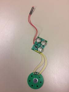 Button batteries inside of tin lid